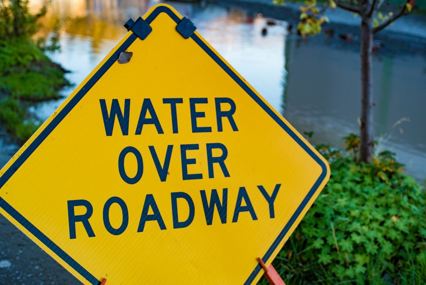 Flooding Disaster Water Over Roadway Street Sign Reflective Pond